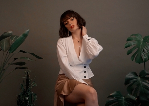 Phoebe Day seated Phoebe Day seated